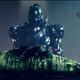 A Guardian and their Ghost in Destiny 2, looking down at a dead worm.